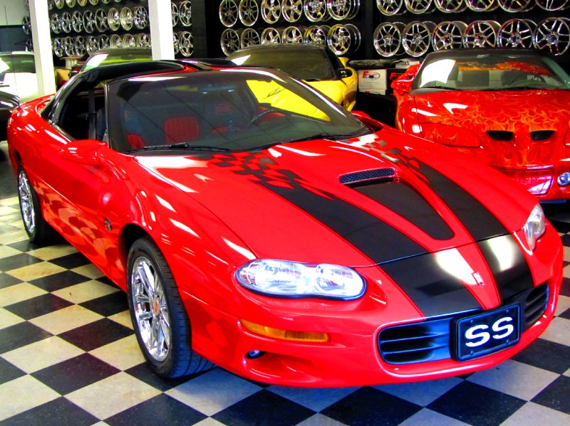 2002REDWITHBLACKSTRIPESSLPSSTTOP6SPEED82MILES/10.JPG