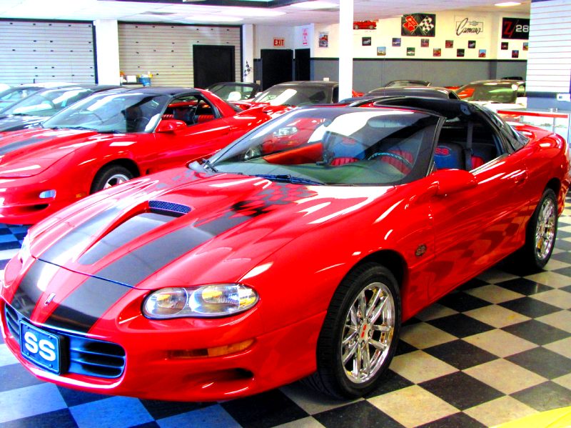 2002REDWITHBLACKSTRIPESSLPSSTTOP6SPEED82MILES/60.JPG